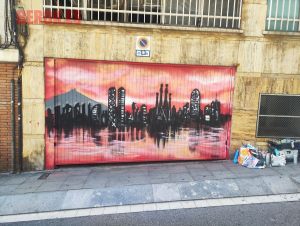 Graffiti skyline rosado Barcelona parking
