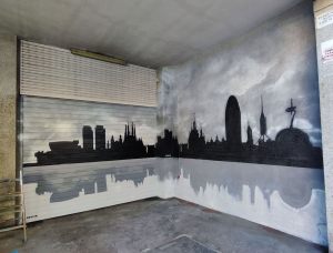 Skyline Barcelona graffiti persiana y pared parking