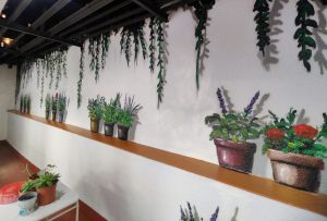 Mural flores trampantojo para patio interior